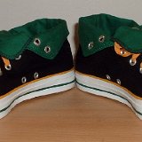 Foldover High Top Chucks  Angled front view of black, green, amber foldovers rolled down to the sixth eyelet.
