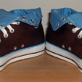 Foldover High Top Chucks  Angled front view of brown and Carolina blue 2 tone foldovers rolled down to the sixth eyelet.