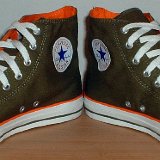 Foldover High Top Chucks  Angled front view of olive green and orange foldovers.