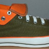 Foldover High Top Chucks  Outside view of a right olive green and orange foldover rolled down to the sixth eyelet.