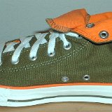Foldover High Top Chucks  Inside patch view of a right olive green and orange foldover rolled down to the sixth eyelet.