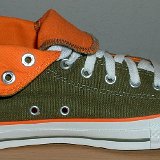Foldover High Top Chucks  Inside view of a left olive green and orange foldover rolled down to the sixth eyelet.