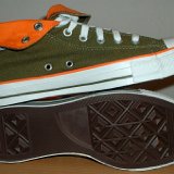 Foldover High Top Chucks  Inside patch and sole views of olive green and orange foldovers rolled down to the sixth eyelet.