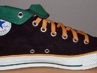 Foldover High Top Chucks Gallery 4  Inside patch view of a left black, green, and amber high top rolled down to the seventh eyelet.