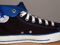 Foldover High Top Chucks Gallery 4  Inside patch view of a left black and royal blue high top rolled down to the seventh eyelet.
