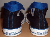 Foldover High Top Chucks Gallery 4  Rear view of black and royal blue high tops rolled down to the seventh eyelet.