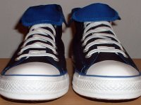 Foldover High Top Chucks Gallery 4  Front view of black and royal blue high tops rolled down to the seventh eyelet.
