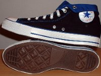 Foldover High Top Chucks Gallery 4  Sole and inside patch views of black and royal blue high tops rolled down to the seventh eyelet.