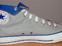 Foldover High Top Chucks Gallery 4  Inside patch view of a left light grey and royal blue high top rolled down to the seventh eyelet.