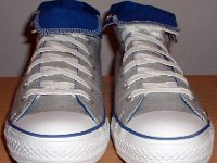 Foldover High Top Chucks Gallery 4  Front view of light grey and royal blue high tops rolled down to the seventh eyelet.