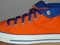 Foldover High Top Chucks Gallery 4  Outside view of a left orange and royal blue high top rolled down to the seventh eyelet.