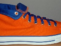 Foldover High Top Chucks Gallery 4  Outside view of a right orange and royal blue high top rolled down to the seventh eyelet.