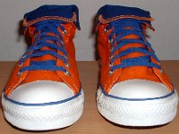 Foldover High Top Chucks Gallery 4  Front view of orange and royal blue high tops rolled down to the seventh eyelet.