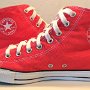 Foldover Double Upper High Top Chucks  Inside patch views of laced up red foldover double upper high top chucks.