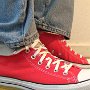 Foldover Double Upper High Top Chucks  Wearing folded down red foldover double upper high top chucks with blue jeans, right side view.