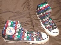 Chucks with Geometric Pattern Uppers  Inside patch and angled top view of glittery checkered high tops.