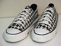 Chucks with Geometric Pattern Uppers  Criss cross pattern low cuts, angled front view.