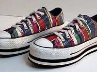 Chucks with Geometric Pattern Uppers  Striped platform low cuts, angled side view.