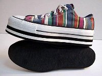 Chucks with Geometric Pattern Uppers  Striped platform low cuts, side and sole views.