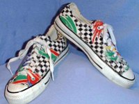 Chucks with Geometric Pattern Uppers  Checkered tropical pattern low cuts, angled side views.