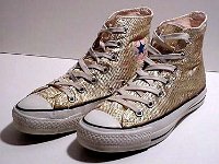 Chucks with Geometric Pattern Uppers  Woven gold pattern high tops, angled side views.