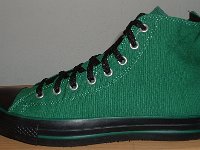 Goth High Top Chucks  Left green and black Goth high top, outside view.