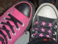 Goth High Top Chucks  Goth chucks were also made in a pink and black model, as seen in this mismatched pair.