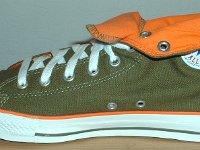 Green and Orange Foldover High Top Chucks  Inside patch view of a right olive green and orange foldover rolled down to the sixth eyelet.