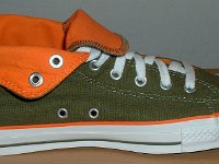 Green and Orange Foldover High Top Chucks  Inside view of a left olive green and orange foldover rolled down to the sixth eyelet.