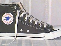 Grey Chucks  Left charcoal high top, inside patch view.