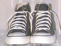 Grey Chucks  Charcoal high tops, front view.