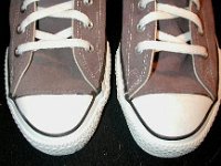 Grey Chucks  Grey suede high tops, closeup of toe caps.