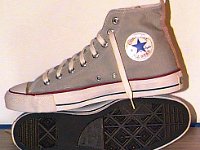Grey Chucks  Grey vintage high tops, right inside patch and sole view.