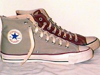 Grey Chucks  Vintage grey and maroon high tops, side view.