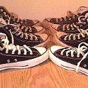 Group Shots of Chucks  Black high tops, arranged from brand new to well worn.