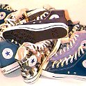 Group Shots of Chucks  Pile of blue high tops, including sky blue, camouflage blue, navy blue, and caribbean blue chucks.