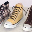 Group Shots of Chucks  Plaid, yellow, and brown high tops with narrow laces.