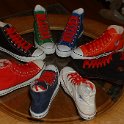 Group Shots of Chucks  Core and seasonal high top chucks with red retro shoelaces, shot 3