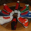 Group Shots of Chucks  Core and seasonal high top chucks with red retro shoelaces, shot 4.
