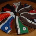 Group Shots of Chucks  Core and seasonal high top chucks with red retro shoelaces, shot 6.