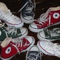 Group Shots of Chucks  Wheel of red, green optical white, and navy blue high top chucks.