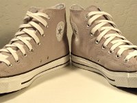 Gull Grey High Top Chucks  Angled front view of gull grey high tops.