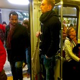 Guys Wearing Red Chucks  Guy on subway wearing red high top chucks.