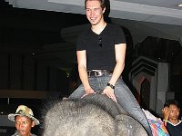 Hanson  Taylor riding an elephant.