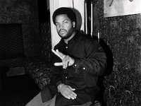 Hip-Hop musicians wearing chucks.  Ice Cube wearing a pair of chucks.