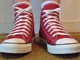 jesterredhi14  Wearing jester red high top chucks, front view 1.
