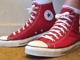 jesterredhi20  Wearing jester red high top chucks, left view 1.