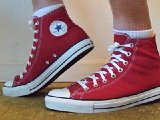 jesterredhi21  Wearing jester red high top chucks, left view 2.