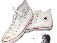 Josh Groban  An autographed pair of white high top chucks sold at a celebrity auction.