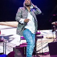 Kendrick Lamar  Kendrick Lamar performs in red high tops onstage at the Honda Center in Anaheim, California.  (Photo by Daniel Knighton/WireImage) : Celebrities|Music